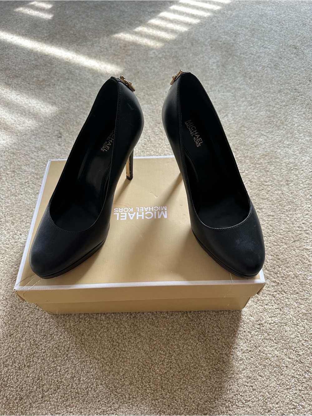 MICHAEL Michael Kors Black Leather Pointed Toe Stiletto Pumps with Gold Accent